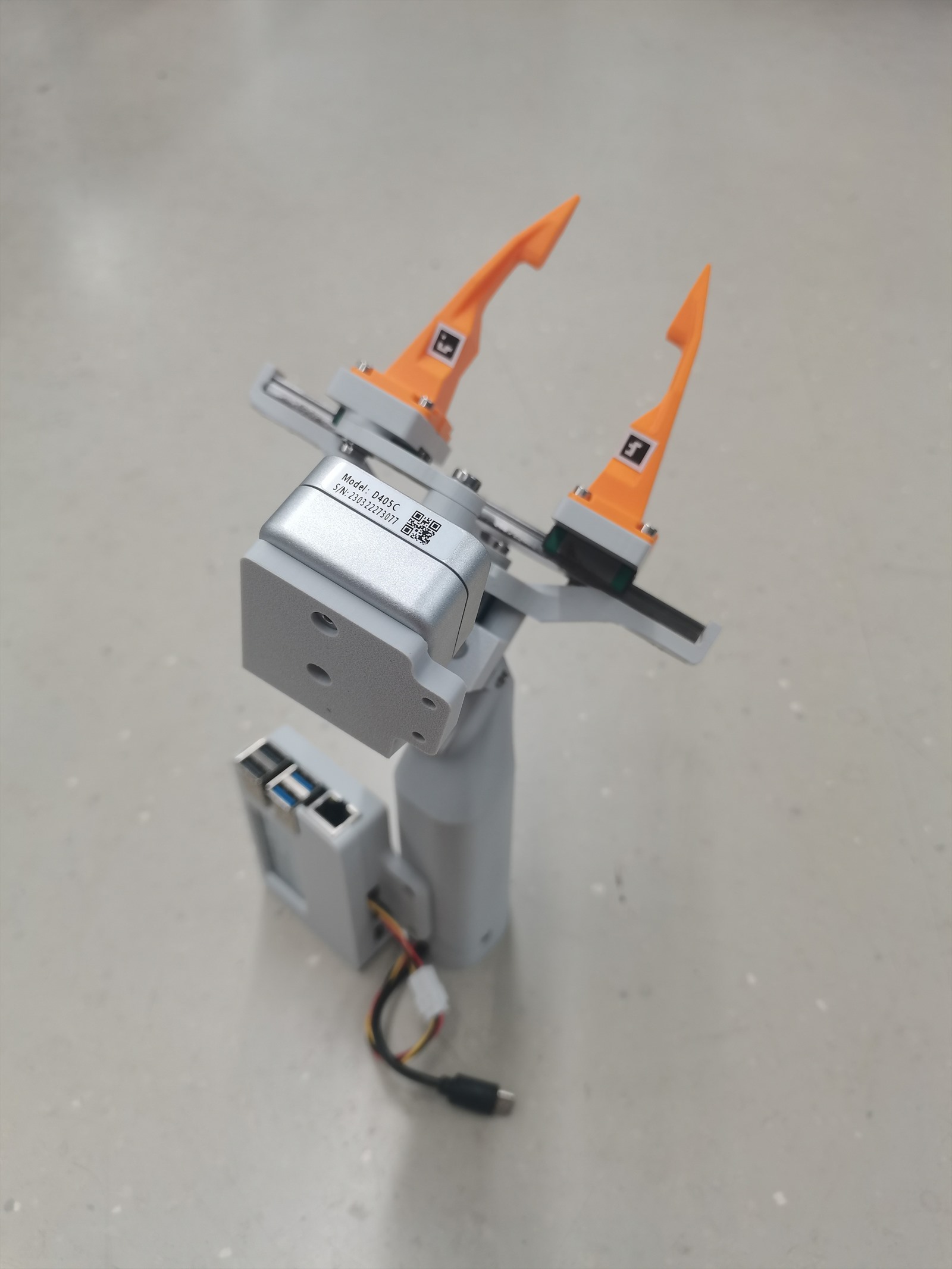 Side view of the SROI V2 camera and parallel gripper