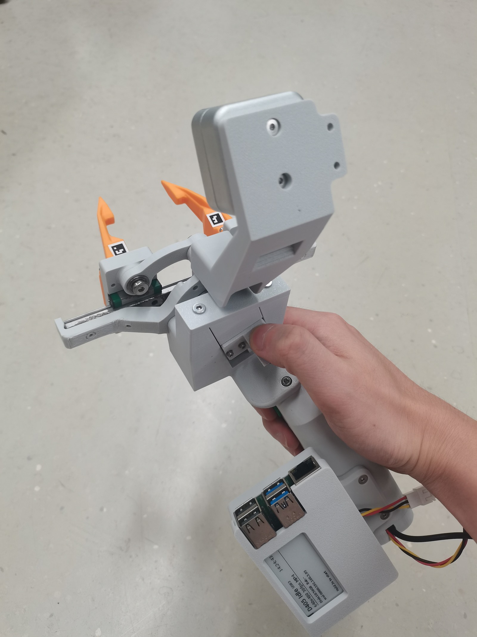 Operator holding the SROI V2 demonstration device